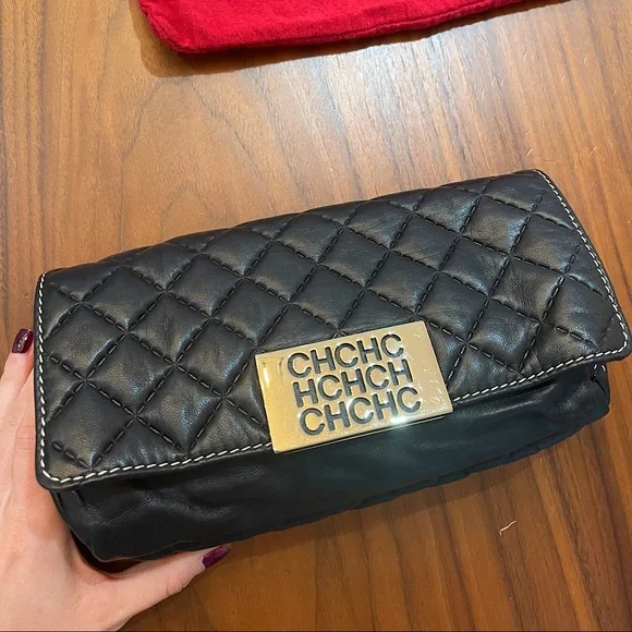 Carolina herrera pouch hotsell